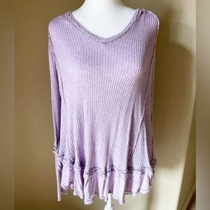 Free people blouse that is flowy.